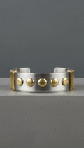Industrial brass-accented stainless steel cuff